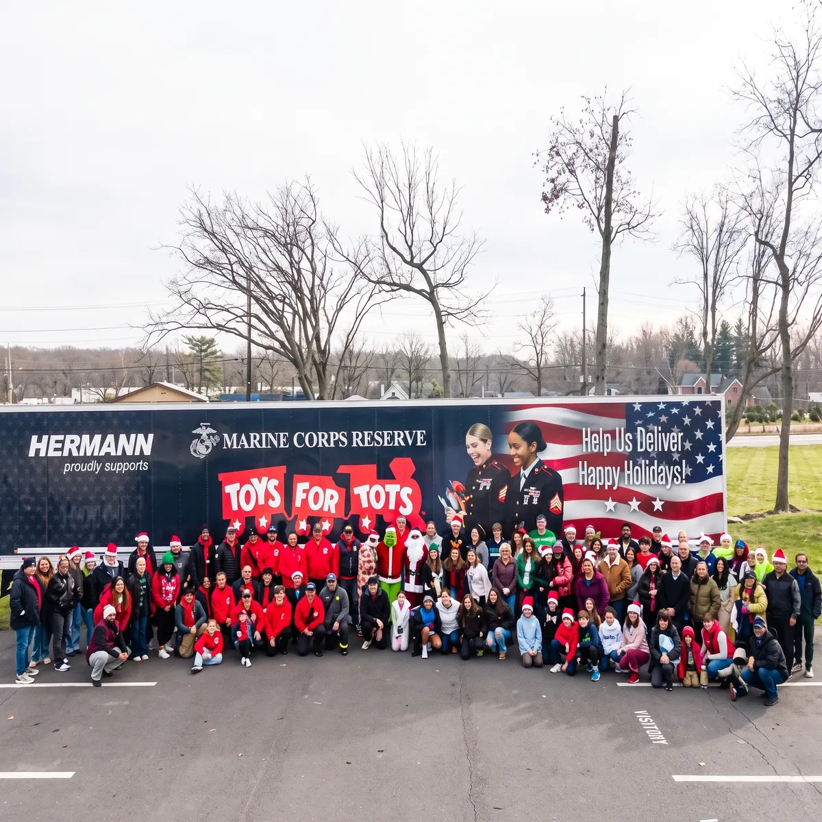 Hermann team group photo at a Toys for Tots event