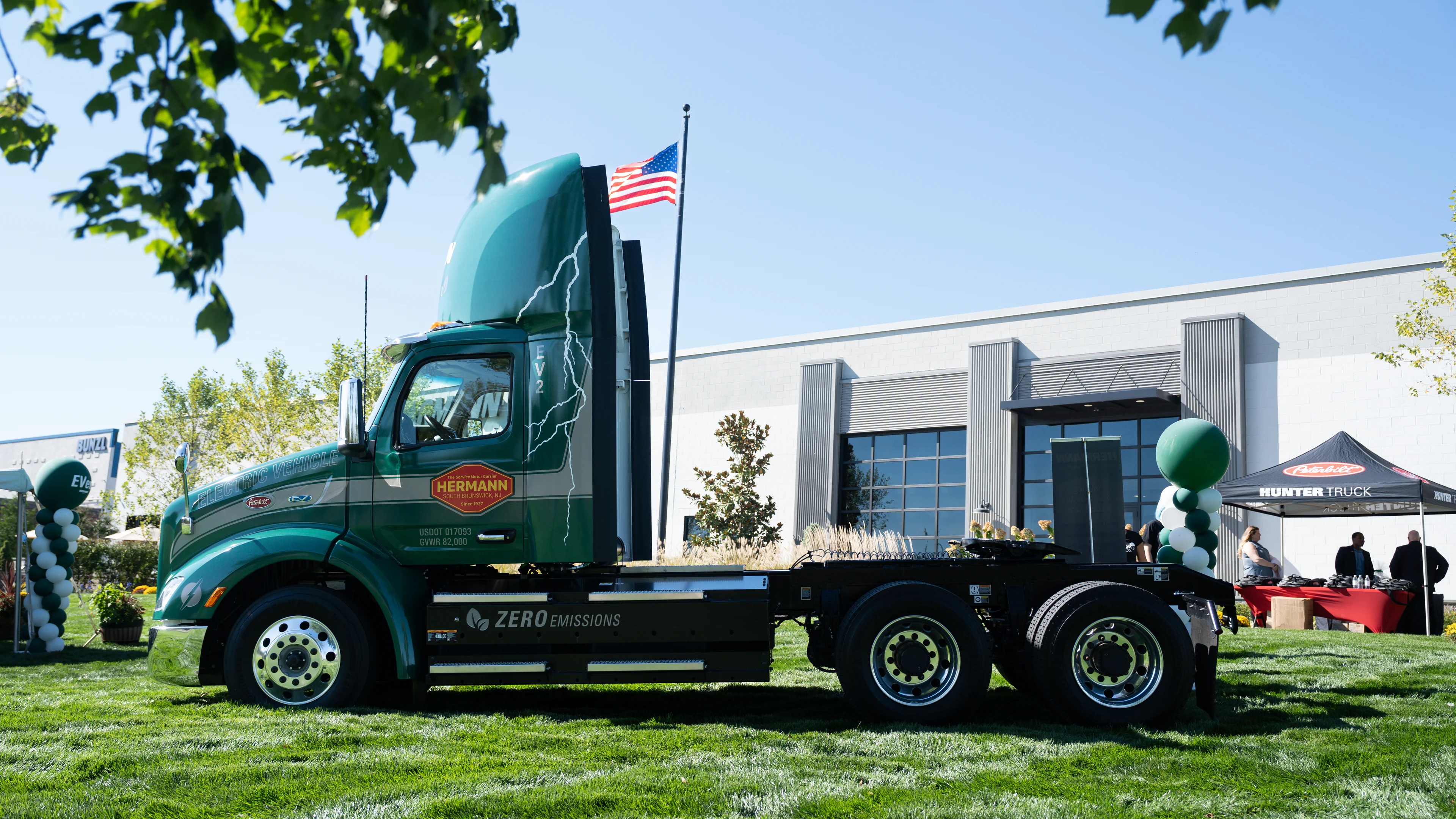 Hermann's battery electric Peterbilt tractor, lettered Hermann and Zero Emissions, at the company's EV launch