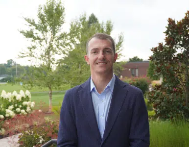 Headshot of Adrian Hurgoi, VP of Finance Operations at Hermann Services